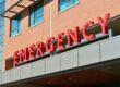 a-red-signage-that-reads-emergency-in-bold-letters